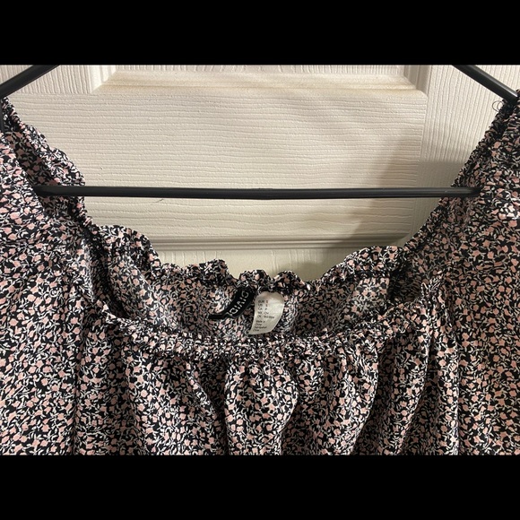 Pink and black floral ruffled square top with above elbow sleeves that tie. - Picture 3 of 3